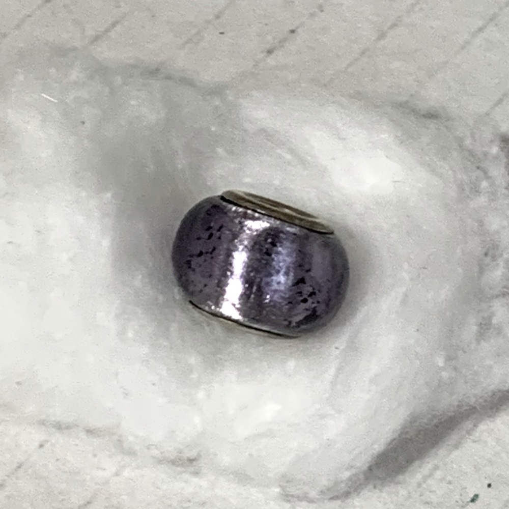 Silver toned Purple metallic glass bead